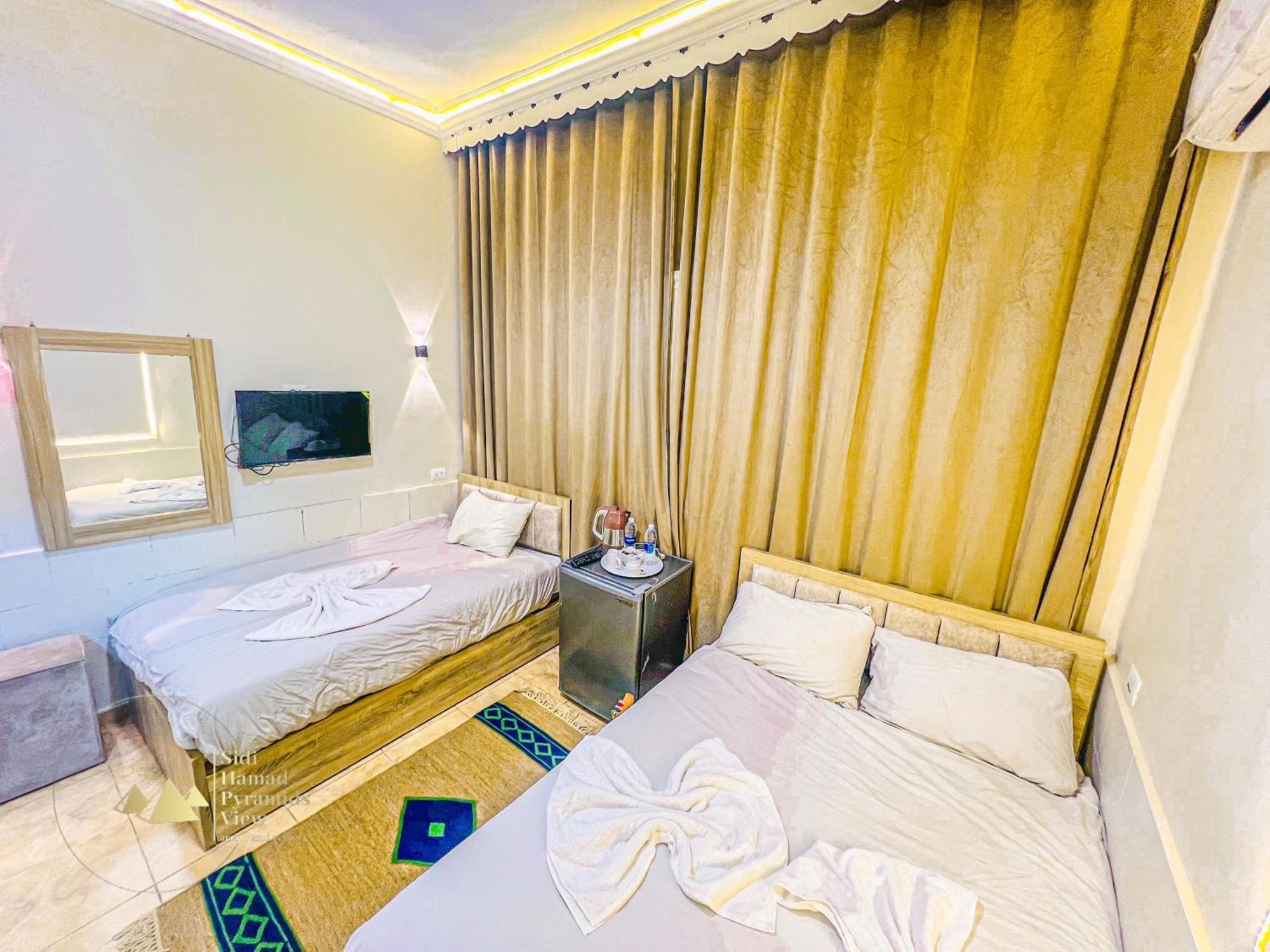 Sidi Hamad Pyramids View Hotel Kafret el-Gabal Exterior foto