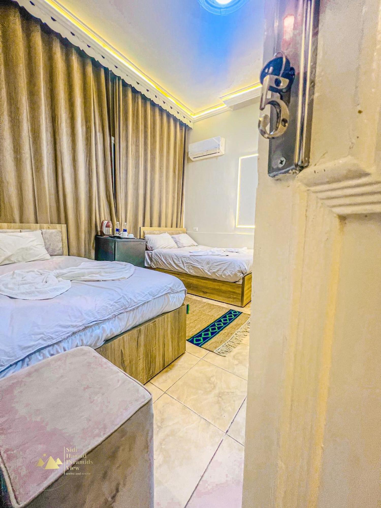 Sidi Hamad Pyramids View Hotel Kafret el-Gabal Exterior foto